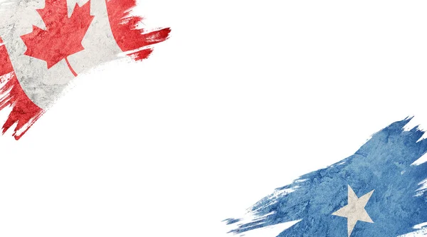 白地にカナダとソマリアの国旗 — ストック写真